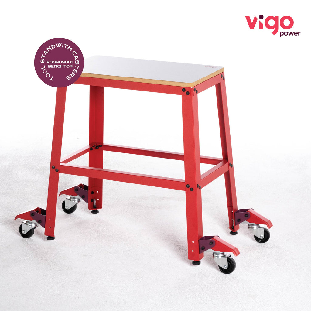 A red metal tool stand with protective coating, featuring adjustable wheels and a beige MDF tabletop, designed to support power tools.｜card